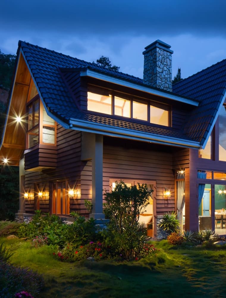 A house illuminated at dusk