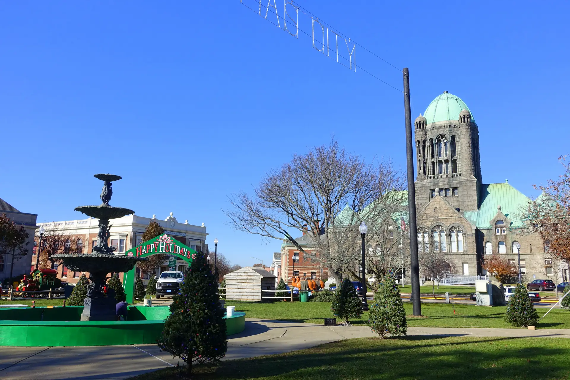 Taunton Green with its fountain, bare trees, and the domed Bristol County courthouse on a clear day